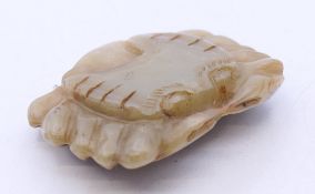 A jade model of a crab. 5 cm x 4 cm.