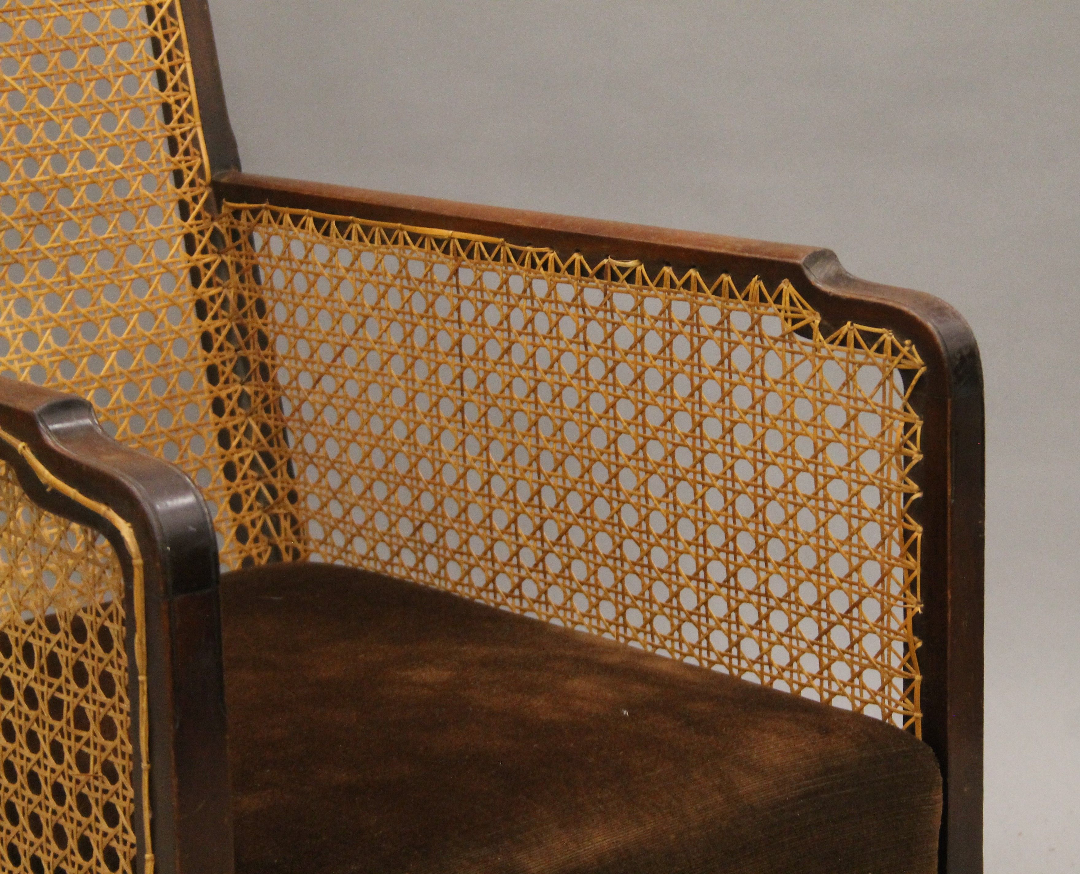 An early 20th century mahogany framed Bergere armchair. 54 cm wide. - Image 3 of 4