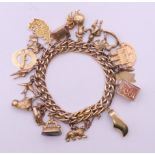 An unmarked 9 ct gold charm bracelet. 18 cm long. 68.6 grammes total weight.