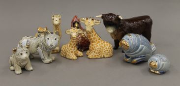 A quantity of Rinconada animal figures and a ceramic bull. The latter 17.5 cm long.
