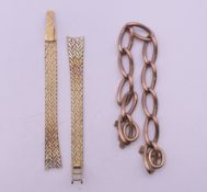A 9 ct gold watch strap and a section of 9 ct gold chain. Chain 16.5 cm long. 37.1 grammes.