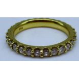 18ct yellow gold full eternity ring set with diamonds, stamped 750, size M, 4.1g