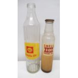 Shell Rotella glass oil bottle and a Shell X-100 Motor Oil bottle with bottle cap (2)