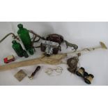 Voigtlander Vitomatic II SLR camera, four green chemist bottles, cast metal model of a horse, pair