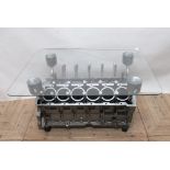 Engine block coffee table with rectangular glass top
