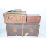 Vintage travel trunk (locks and handles damages, A/F), a smaller leather carry case, a wicker picnic