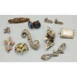 Six brooches including 1950's marcasite and 4 pairs of earrings