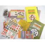 Collection of vintage Meccano, including wheels, instruction book, Meccano gears, collection of