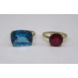 9ct yellow gold ring set with swiss blue topaz, stamped 375, size S, and a 10k yellow gold ring