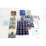 Collection of GB collectable coins packs and UNC individual collectable coins, mostly 50p and £2