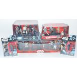 Three sealed and unopened Disney Store action figure sets (Force Awakens, Rogue One and Mega