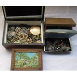 Four jewellery boxes containing a large collection of costume jewellery including pearls,
