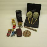 Two Covent Garden market embossed plaques, Jakko pen set, Kodak no.1 pocket Kodak Jr, cigar case,