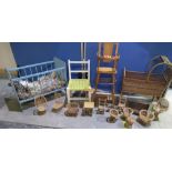 Collection of dolls furniture of various sizes, including chairs, highchair, cot etc.