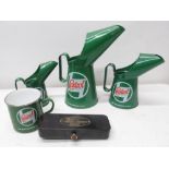 Three Castrol oil cans, a Castrol mug and a black Castrol metal holder (5)