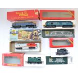 Five boxed OO/HO gauge electric train models in fair to good used condition, incl.an Athearn Santa