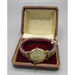 Late 1950s Rotary 9ct gold hand wound wristwatch. Signed two tone silvered dial with applied