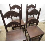 Set of four C17th style oak Derbyshire chairs, turned and carved pierced backs and solid seats on