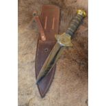 Large C. Bark USA dagger with brass hand guard, large brass bolster, leather and brass bound