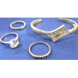 Sterling silver bangle set with crystals, a collection of hallmarked silver rings and a large