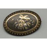 Late C19th tortoiseshell pique decorated brooch in a yellow and silvered metal bird on foliate