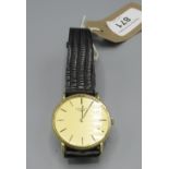 1980s Longines gentleman's evening hand wound dress watch, signed champagne coloured dial with