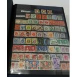 Collection of British mostly commonwealth stamps inc. Bermuda, Hong Kong, India, Rhodesia, etc. from