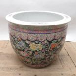 Mid C20th Chinese porcelain garden jardiniere, decorated in polychrome enamel with floral motif, H