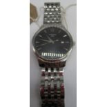 Gents Tissot stainless steel cased quartz wrist watch, circular black dial with arrow markers and