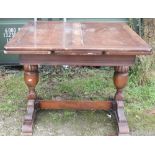 C20th oak finish draw leaf dining table, a pair of Victorian oak framed dining chairs, and a pitch