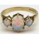 9ct yellow gold ring set with three opals, stamped 375, size P, 2.2g