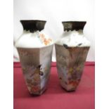 C20th pair of Japanese hexagonal baluster vases, decorated with birds in exotic landscapes, with