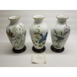 Franklin porcelain The Woodland Bird vase, The Bluebirds of Summer by A J. Rudisill vase (with