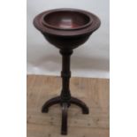 Victorian mahogany Gothic style font, tapering circular moulded top on column support with four down