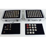 Aluminium coin carry case with four trays of miscellaneous GB collectable coinage, mainly 50ps, £2