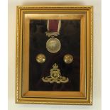 Framed and mounted Royal Artillery display with George VI regular army long service and good conduct