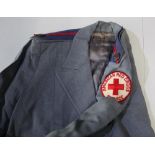 Two American Red Cross service tunics in serge and cotton with insignia, and American nurses cape (