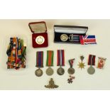 Collection of various militaria including medals, medallions, ribbons, etc, cased National Service