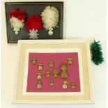 Framed and mounted display of assorted fusilier cap badges including Royal Inniskilling, Royal Welsh
