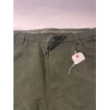 Pair of as new lined Musto country trousers, in olive green, size 42/L