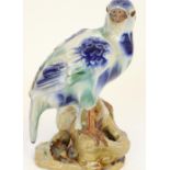 Chinese pottery/terracotta figure of an exotic bird, decorated in a Sancai type drip glaze, H23cm