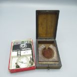 Early C20th souvenir olive wood pocket watch stand with inlaid top, hinged easel stand, W7.5cm D10.