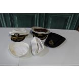 Collection of Naval hats inc. two US ratings caps, Royal Navy officers peaked cap with acorn oak