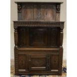 C17th and later carved oak buffet, frieze carved W.R. 1669, open waist and carved cupboard with
