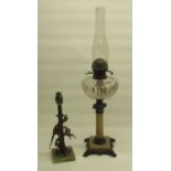 Late c19th onyx and gilt mounted Corinthian column oil lamp with faceted cut clear reservoir, on