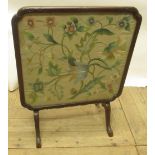 C20th mahogany framed fire screen table with inset silk work floral panel, on 4 splay legs