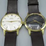 Two HMT Sona gold plated hand wound wristwatches, one with a textured cream dial with applied