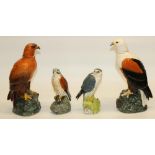 Royal Doulton Birds of Prey decanters: Fish Eagle brandy decanter, and three Whyte & Mackay whisky