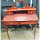 Edwardian mahogany bonheur du jour with raised back with inset mirror and two drawers, two frieze