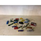 Collection of toy cars, planes and also including Nokia 3410 mobile phone